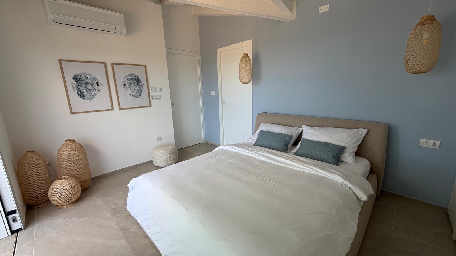 Hauptschlafzimmer in Blau und Beige